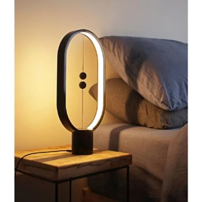 Hauptbild des Produkts Stolní lampa Heng Balance Ellipse, černá, 5V/1A, teplá bílá, USB, s vypínačem ve vzduchu,